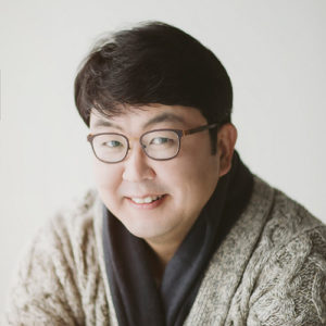 Dr. Min Jin, tenor